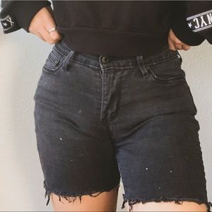 90s mid thigh distressed bottom jean shorts